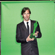 Bay poses triumphantly with his wire-frame best-director Oscar.
